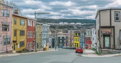 Brightly painted row houses along a hilly street in St. John's, Newfoundland