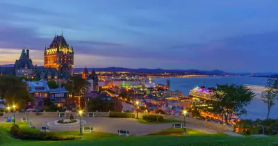 Old Quebec and the Château Frontenac at sunset, with the St. Lawrence River beyond